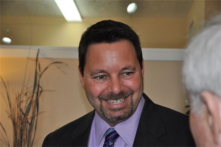 Allan Mansoon, Assemblyman 74th District visits with guest at the Laguna Beach Legal Grand Opening Celebration