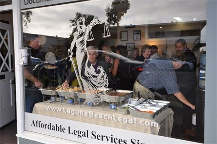 Passerby's view the festivities from Pacific Coast Highway