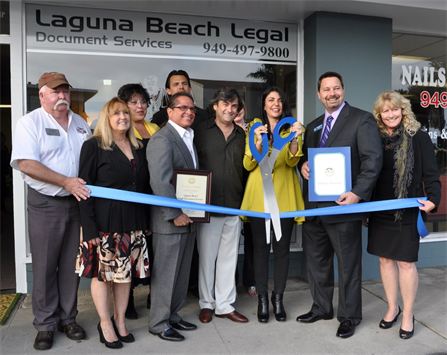 Newport Beach Chamber of Commerce congratulates Laguna Beach Legal on their new location.  Photo includes D.J. Martin (left), Billie Sutherland, Connie Burlin, Sergio Prince, Justin IntVeld, Roland Ortiz, Ellie Ortiz, Allan Mansoor (Assemblyman) and Pam Smith (Newport Chamber)